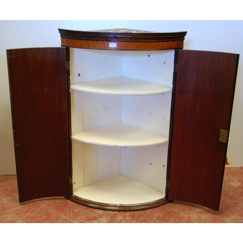 406 - George III inlaid mahogany corner cupboard, c. late 18th/early 19th century, with two doors enclosin... 