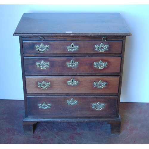 411 - George III mahogany bachelor's chest of four graduated drawers with brushing slide, on bracket feet,... 