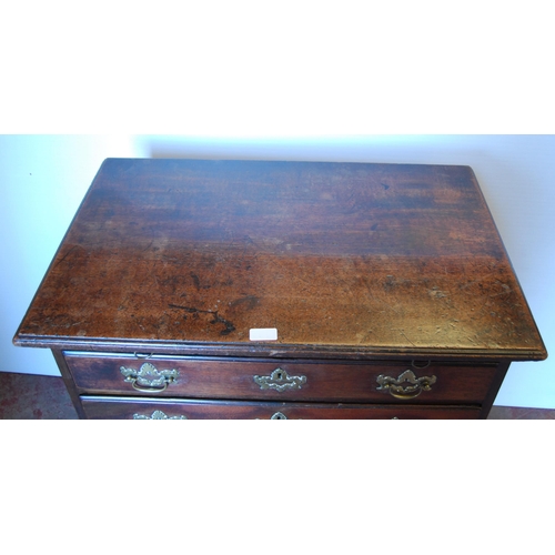 411 - George III mahogany bachelor's chest of four graduated drawers with brushing slide, on bracket feet,... 