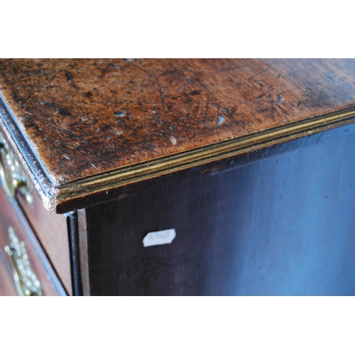 411 - George III mahogany bachelor's chest of four graduated drawers with brushing slide, on bracket feet,... 