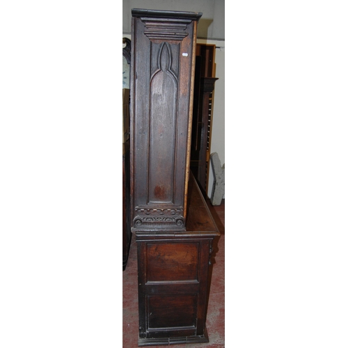 412 - 19th century oak dresser, the breakfront top section with four panelled doors enclosing a shelved in... 