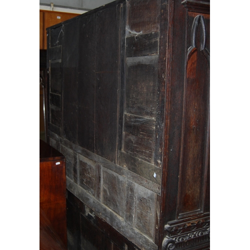 412 - 19th century oak dresser, the breakfront top section with four panelled doors enclosing a shelved in... 