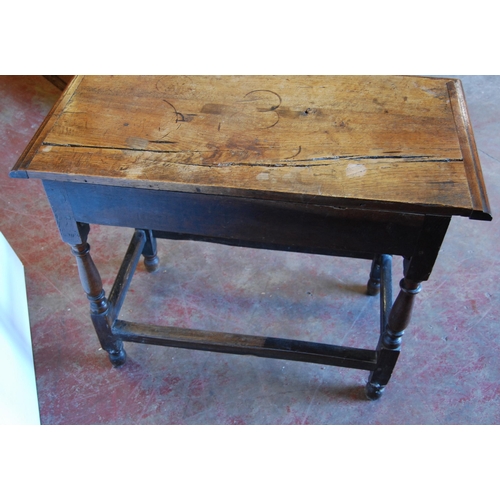 414 - English Arts & Crafts Oak writing table, the long drawer with ornate peg handles, on turned supp... 