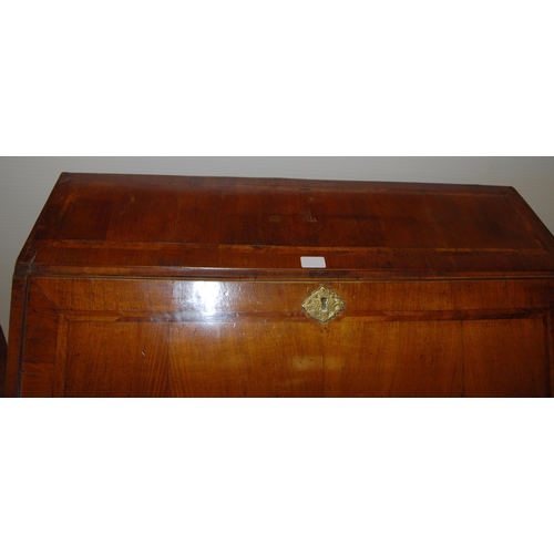 415 - 18th century walnut inlaid writing bureau, the fall front enclosing fitted drawers and pigeon holes ... 