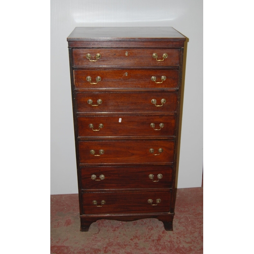 417 - Mahogany tallboy chest of seven graduated drawers, on bracket feet, 124.5cm high, 61cm wide and 46cm... 