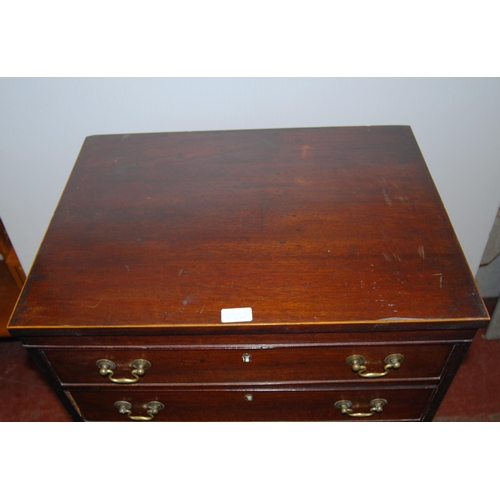 417 - Mahogany tallboy chest of seven graduated drawers, on bracket feet, 124.5cm high, 61cm wide and 46cm... 