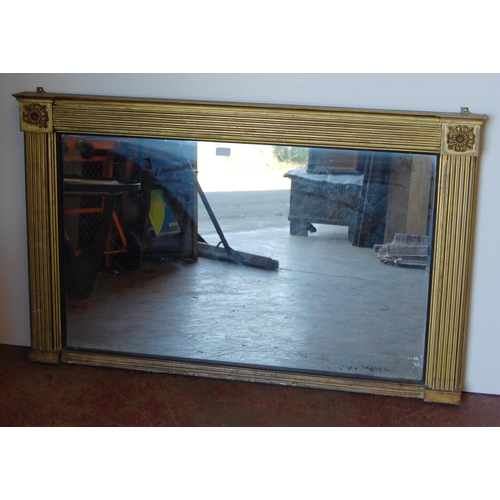 418 - Early 19th century Regency-style giltwood overmantel mirror with reeded decoration and flowerhead ro... 