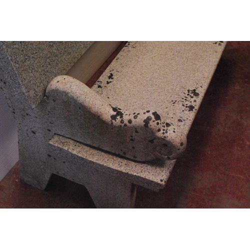 420 - Granite bench with detachable back rest, seat and scroll ends, approximately 86cm high, 131cm wide a... 