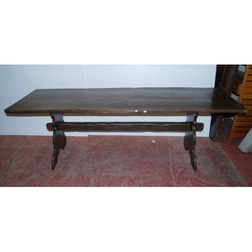 421 - Arts & Crafts-style oak refectory table with long plank top, on trestle ends united by a peg-joi... 