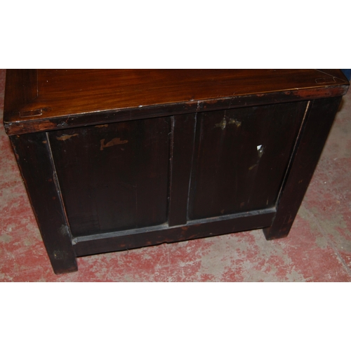 407 - Pair of Chinese elm cupboards (last quarter 20th century) of low form with two doors enclosing a she... 