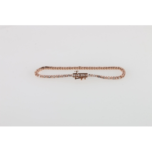 72 - 10ct rose gold bracelet set with baguette and round brilliant-cut diamonds, with open box clasp and ... 