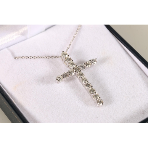 90 - 18ct white gold cross set with round brilliant-cut diamonds on an 18ct white gold chain, diamond wei... 