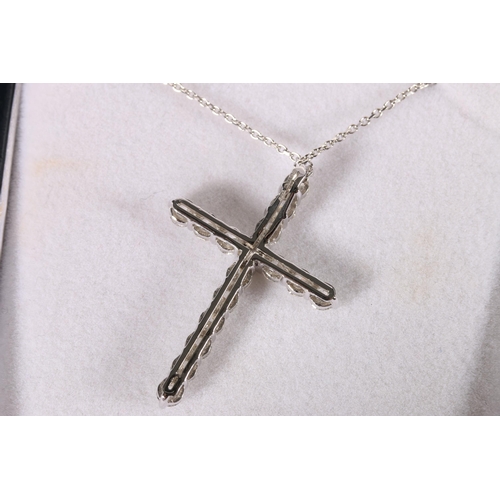 90 - 18ct white gold cross set with round brilliant-cut diamonds on an 18ct white gold chain, diamond wei... 