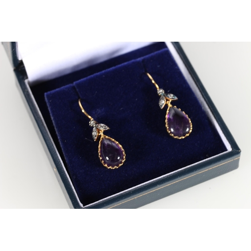 94 - Pair of 9ct yellow gold and silver cabochon amethyst and diamond drop earrings, 2cm.