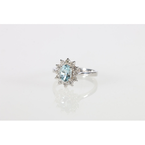 114 - 18ct gold aquamarine and diamond cluster ring, aquamarine weight approximately .8ct, round brilliant... 