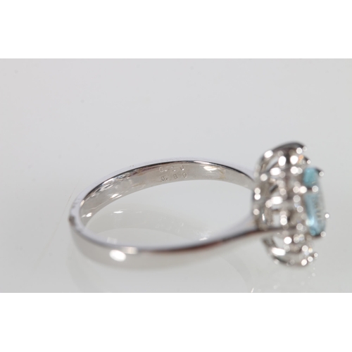 114 - 18ct gold aquamarine and diamond cluster ring, aquamarine weight approximately .8ct, round brilliant... 