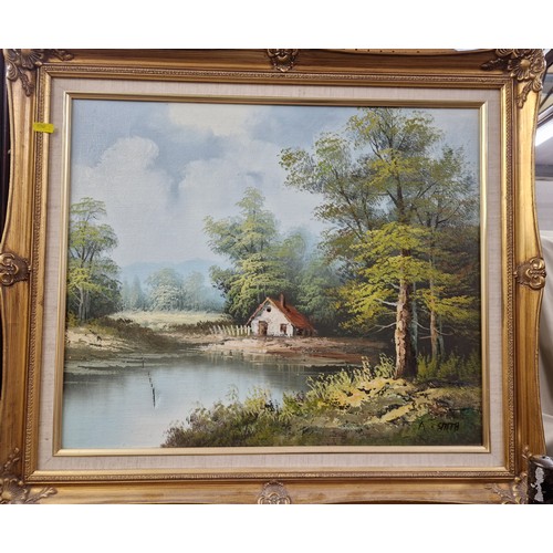 395 - A Smith 'Cottage by lake' oil on canvas, 58 x 50 (75 x 65 in gilt frame with Street scene signed Gre... 