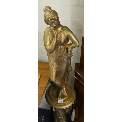 574 - Gold painted garden figure in the form of a lady.