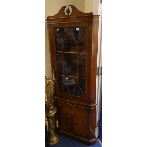 576 - Siesta mahogany astral glazed corner cabinet.