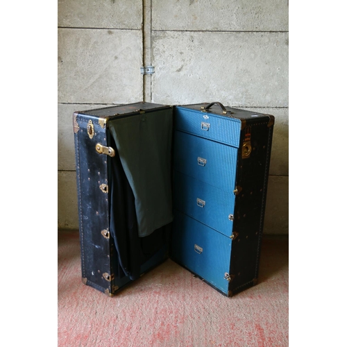 845 - Vintage travelling trunk, with initials 'R C' and inscribed 'The Oshkosh Trunks Incorporated', conta... 