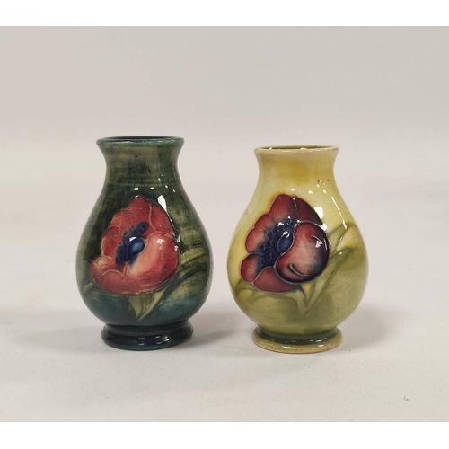 258 - Two William Moorcroft miniature pottery vases, tube lined, in the Hibiscus and Anemone design, stamp... 