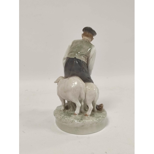 282 - Royal Copenhagen figure group modelled as a farmer herding two sheep, No 627, initialled to undersid... 