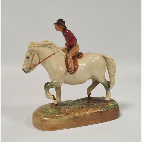 286 - Royal Doulton figure group The Dapple Grey by W M Chance HN 2521, modelled as a farmers boy riding a... 