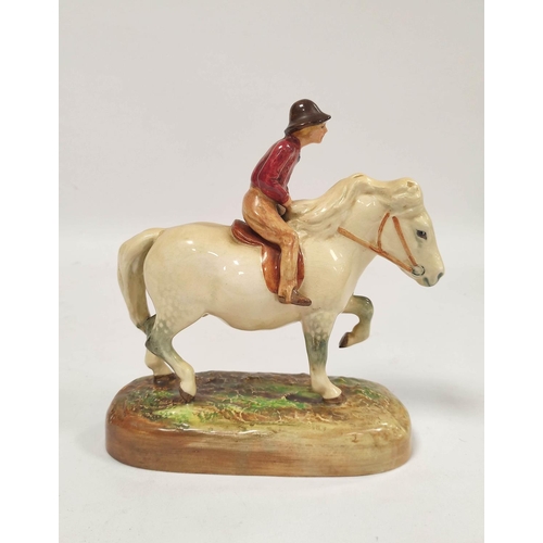 286 - Royal Doulton figure group The Dapple Grey by W M Chance HN 2521, modelled as a farmers boy riding a... 