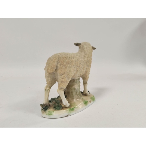 288 - 19th century pair of Staffordshire figures of sheep, raised on encrusted naturalistic bases, 12cm hi... 