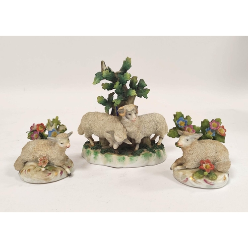 289 - Early 19th century Staffordshire figure group, modelled as two lambs next to a tree, raised on encru... 