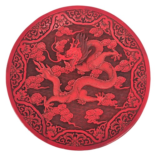 Chinese cinnabar plaque, dragon and lotus flower pattern.