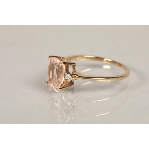 45 - 9ct gold ring set with pink center stone between two small Diamondsring size N