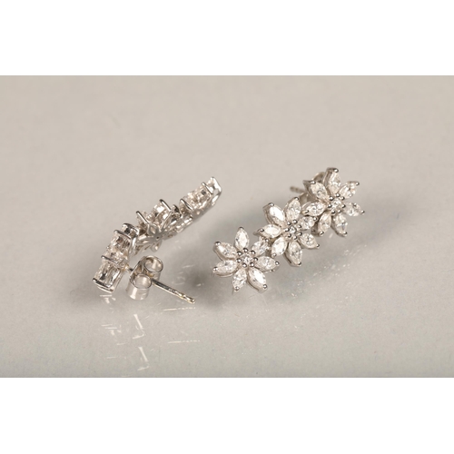 57 - 18ct white gold Diamond cluster 'Lorique' pair of flower design white stone drop earrings