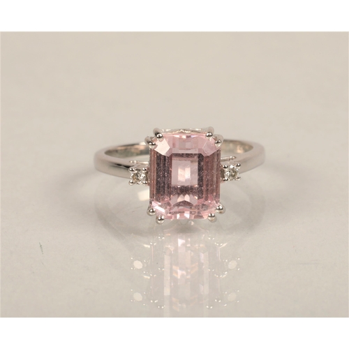 62 - Ladies 14ct white goldring set large pink stone with a small Diamond at either sidering size N/O... 