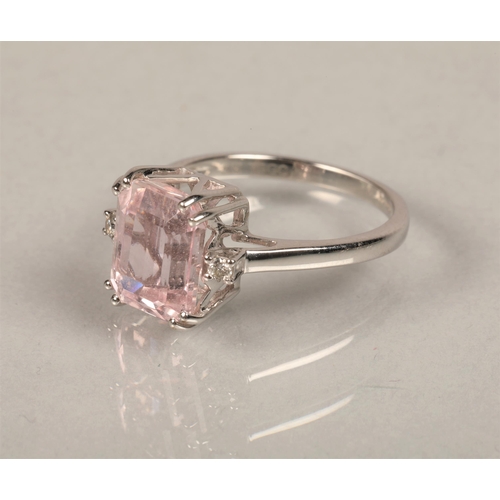 62 - Ladies 14ct white goldring set large pink stone with a small Diamond at either sidering size N/O... 
