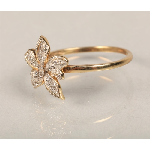 68 - 9ct gold band with white stones in flower designring size O