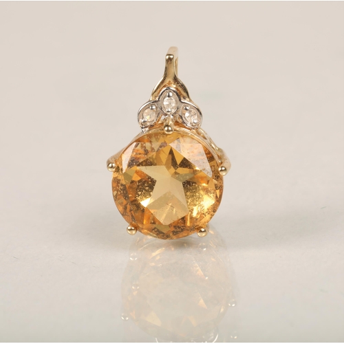72 - 10ct gold pendant set with large citrine  and three small Diamonds