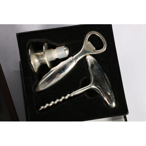 105 - Shudehill art glass bottle stopper and two other corkscrews, all boxed