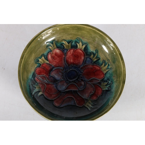 10A - Moorcroft footed bowl with flower to well, paper label to base 'Potters to the Late Queen Mary', 12c... 