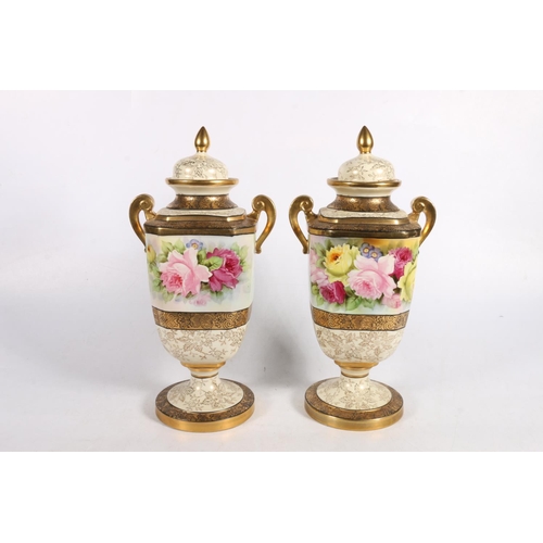 110 - Pair of Noritake floral decorated urns and covers