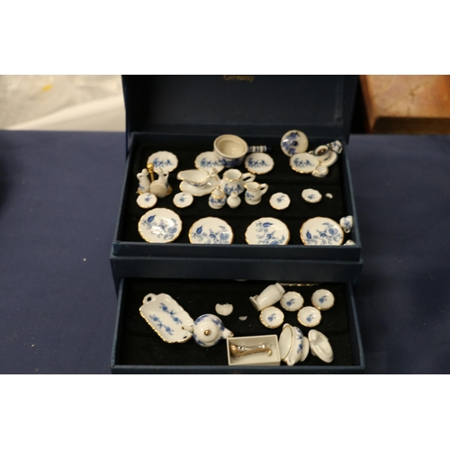 130 - Reuler Porzellan German blue and white miniature teaware, also two other miniature teasets, a Bellee... 