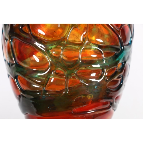 42 - Mdina Art Glass trailed orange ground vase, with blue overlay.