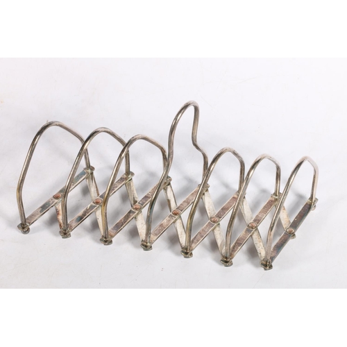 45 - Patented silver-plated expanding toast rack, and another with the letters 'TOAST'.  (2)