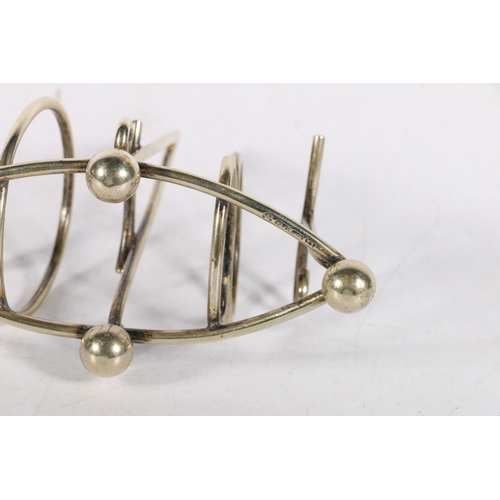 45 - Patented silver-plated expanding toast rack, and another with the letters 'TOAST'.  (2)