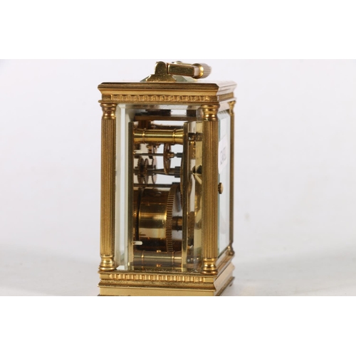 97 - Small brass four glass carriage clock by Mappin & Webb,  9cm.