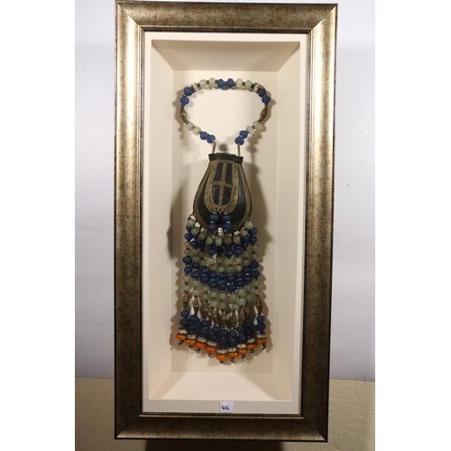 416 - AFRICAN SCHOOL, an elaborate hardstone, glass and metal necklace with leather pouch, in box display ... 