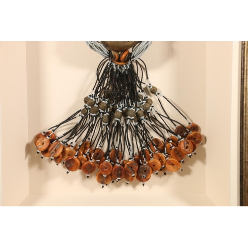 417 - AFRICAN SCHOOL, an elaborate metal and bead necklace, in box display frame, 84cm x 57cm.