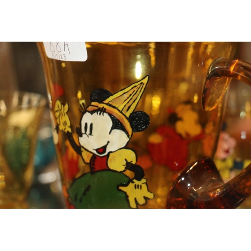 88A - Art deco amber glass lemonade set decorated with hand painted Mickey Mouse characters, jug and six g... 