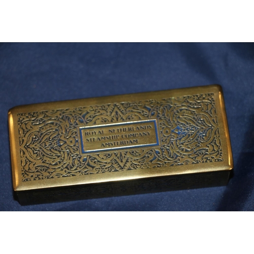 101 - Royal Netherlands Steamship Company stamp box, a Empire Exhibition stamp holder and a set of Peninsu... 