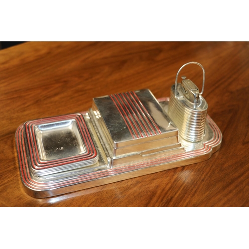 89 - Chromed art deco style smokers desk set comprising lighter, lidded box and for ashtrays,  22cm ... 